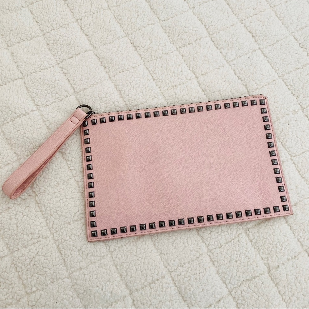Carlos Santana pink studded wristlet